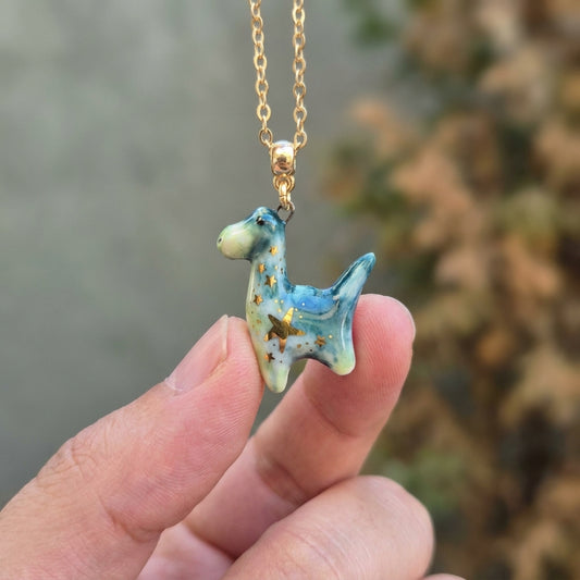 Naszyjnik z porcelanowym dinozaurem – ręczna robota, złoto na porcelanie Biżuteria