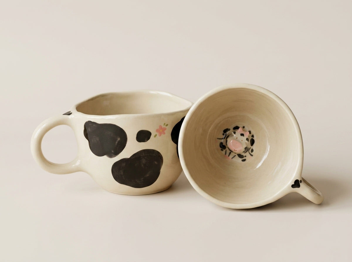 Kubek ceramiczny z krówką na dnie